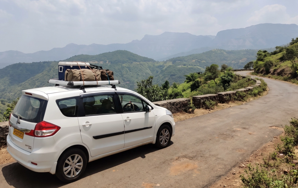 Ertiga commercial tourist cab ready for outstation weekend trips and family tours from Coimbatore.